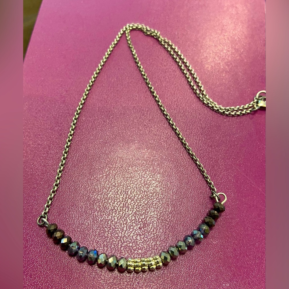 Purplish necklace- pretty design!